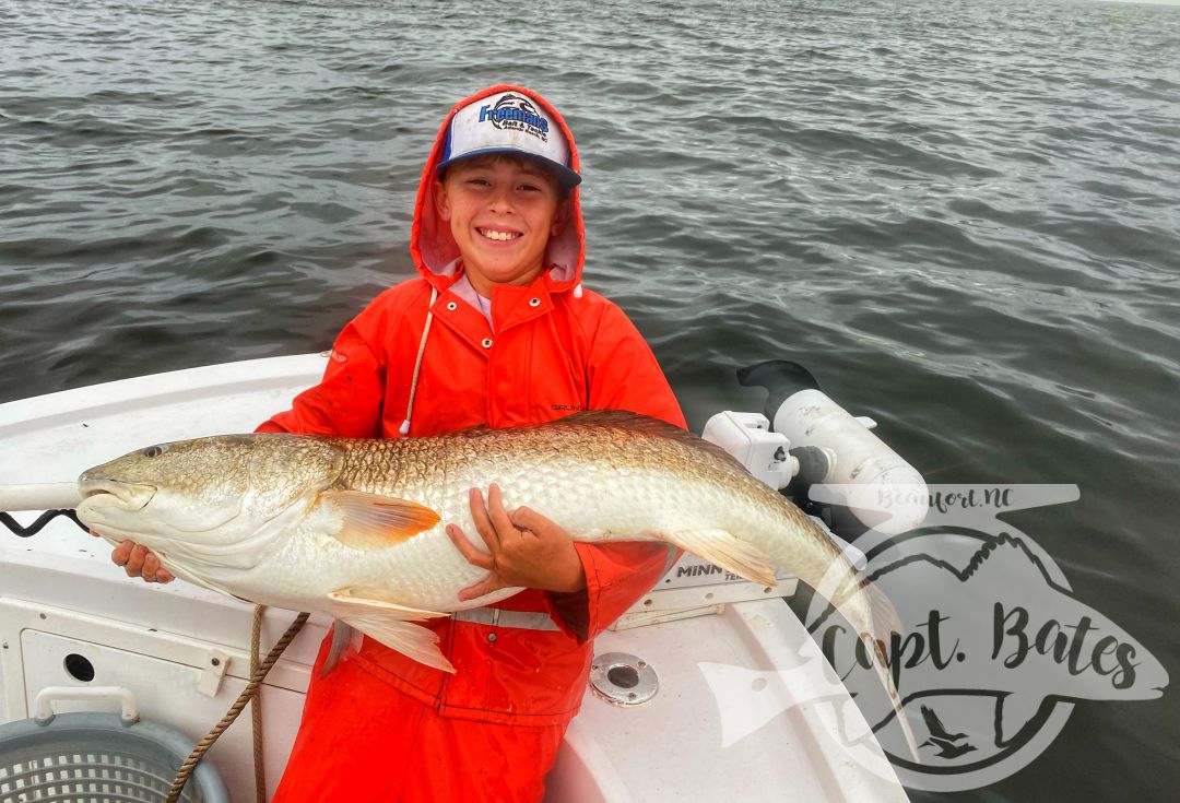 Had Buddy out catching trophy redfish on a stormy evening!