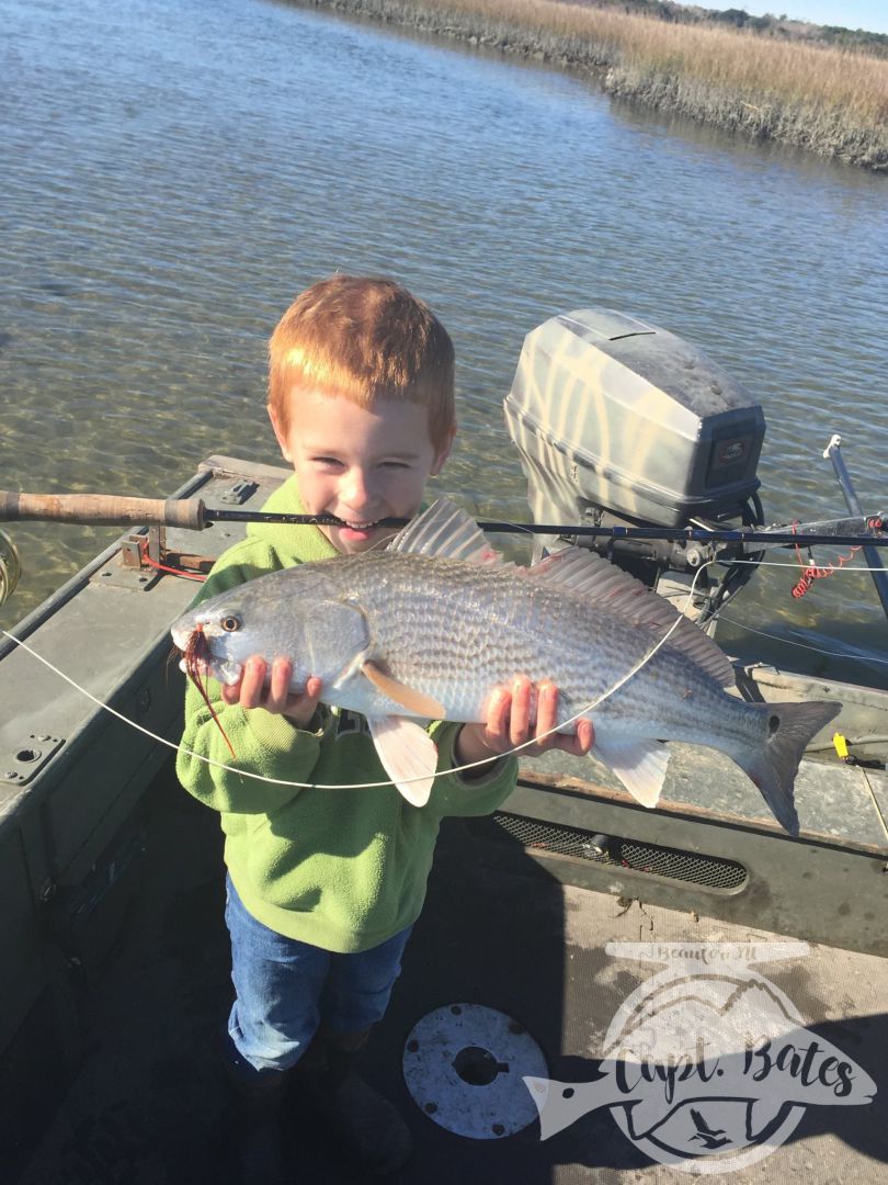 His first ever redfish on the fly! 