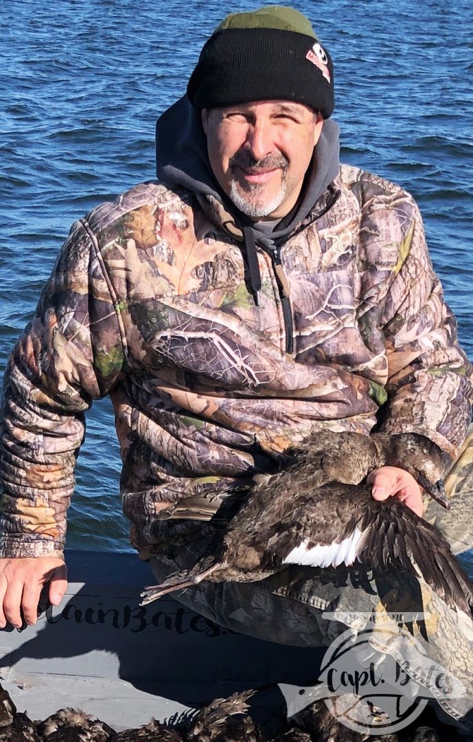 Rough day with crazy storms and wind made yesterday a no go. But we made up for it with this crowd today with TONS of shooting, a 4 man limit of surf, commons, and a white wing scooter!