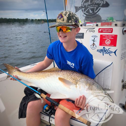 Battled and ran from thunderstorms all day but had about 10 minutes of pure chaos, when we found ourselves in the middle of a big school of trophy drum thrashing and feeding on everything in sight! Lucas’ dad hooked up on the bow first, he was getting ready to hand Lucas the rod, when Lucas hooked up! His dads cork got ate by another drum and broke off! I kept handing him rods and as soon as he’d cast he’d hook up but another fish would eat the cork and break us off! That happened 3 times, all Expect for this one that Lucas landed! We had them feeding within feet of the boat at one point!

So, In two days he caught his personal best speckled trout, PB redfish and the biggest fish he ever caught! Not to mention, he also got to witness a drum feeding frenzy that most people never get to see. Sometimes the toughest conditions, toughest days, are the most rewarding! I guarantee that is a fish and moment, neither him nor his dad will ever forget! The new Temple Fork Outfitters inshore series MH and the Florida Fishing Products Osprey 5000 are the best tools for this fishery, hands down.