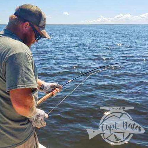 Fly rod bowed on one a Neuse River monster redfish!