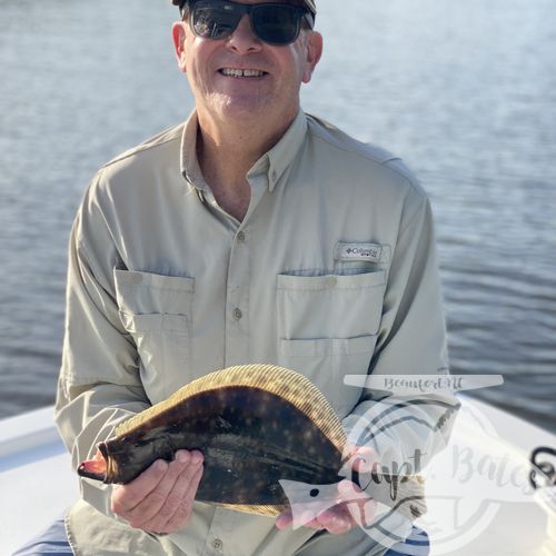 Another blow day with a fine couple catching reds and flounders!