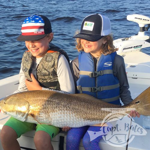 Brother and sister with their first citation drum in Eastern North Carolina