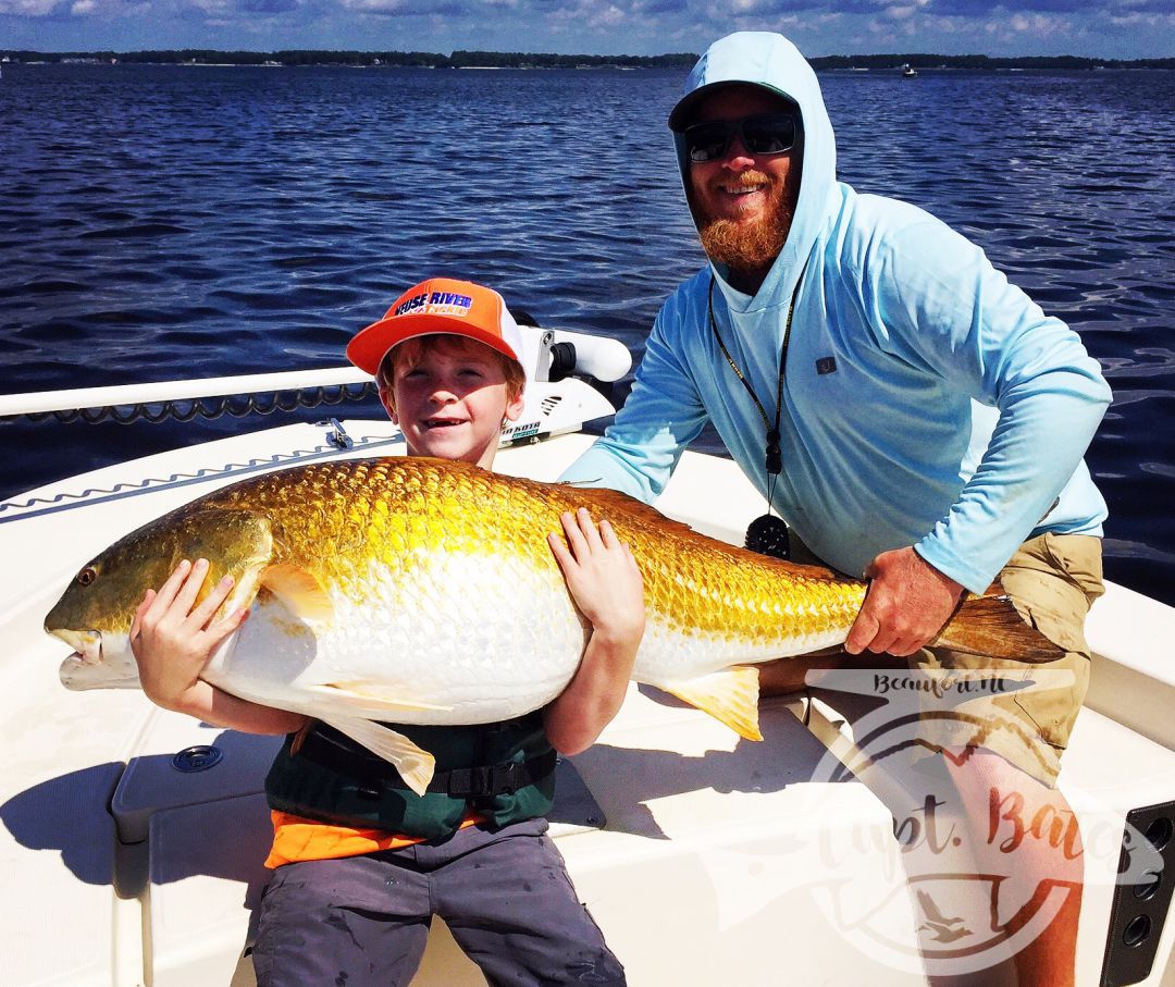 Troys biggest redfish ever! Did it all by himself! other then having to hold his lifejacket, Monster 48" fish!