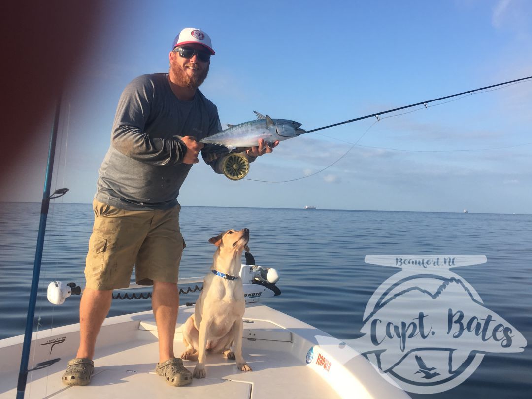 Albie on the fly rod and Roxy just wants a taste!